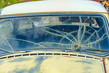 Vintage Car With a Cracked Windshield