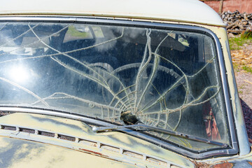 Cracked Windshield of a Vintage Car