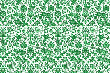 A green and white floral patterned wallpaper. The pattern is very intricate and detailed, with many different types of flowers and leaves. The wallpaper is very eye-catching
