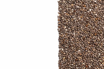 Chia seeds border on white background. Copy space for text. Top view