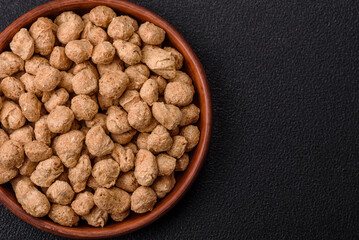 Dry soybean meat pellets, diet food for vegan and vegetarian cuisine