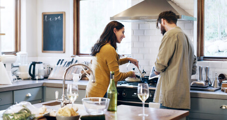 Couple, tablet and cook in kitchen with love, research and video for learning of meal prep in...