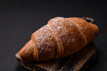 Delicious crispy golden croissant with chocolate filling