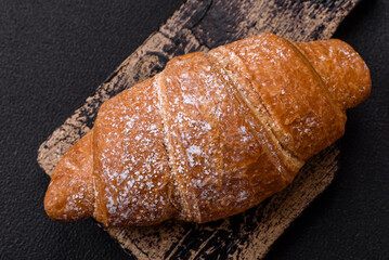 Delicious crispy golden croissant with chocolate filling