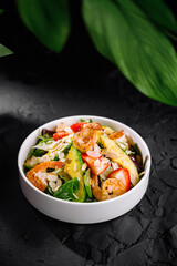 Fresh shrimp and strawberry salad bowl