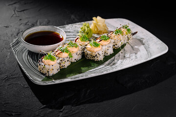 Exquisite sushi roll with shrimp and soy sauce