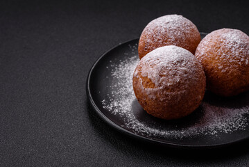 Round homemade cheese donuts glazed with citrus flavor
