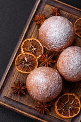 Round homemade cheese donuts glazed with citrus flavor