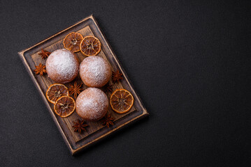 Obraz premium Round homemade cheese donuts glazed with citrus flavor