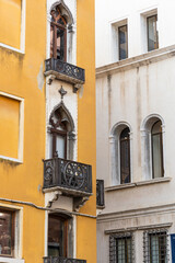 Colourful facades and windows of the old buildings of Venice, Italy