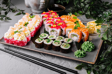 Assorted sushi platter on elegant stone plate