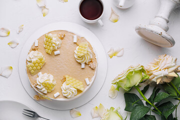 Elegant vanilla cake with floral decoration
