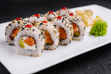 Fresh sushi roll platter on elegant white dish