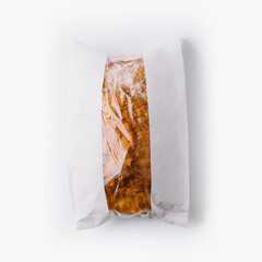 Sealed bread loaf in transparent packaging