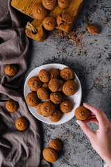 Homemade oatmeal cookies on rustic table