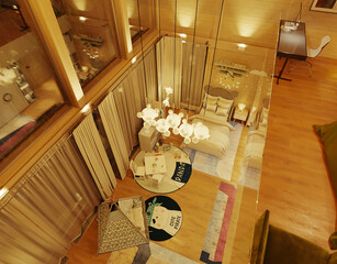 3D visualization of a children's room with evening lighting. Interior of wooden frame house in modern style. 