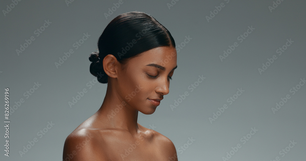 Wall mural Happy woman, face and relax in skincare, natural beauty or cosmetics against a grey studio background. Portrait of female person or model smile in happiness for facial spa or skin treatment on mockup