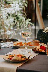 A glass of white wine with dinner