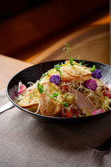 Salad with chicken and flowers