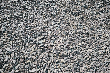 Crushed granite background. Rough texture. Construction Materials. Textures.