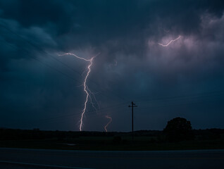 Naklejka premium Chasing lightning storms in the night