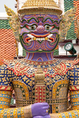 Fototapeta premium Giant statue of a guardian spirit, at a buddhist temple in Bangkok