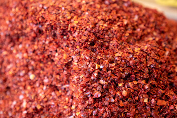 close-up coarsely ground red pepper, hot turkish dried pepper,