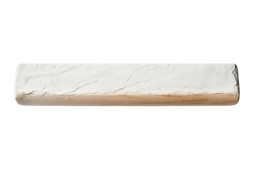 Close-up image of a long rectangular chalk piece isolated on a white background, ideal for educational or artistic use.