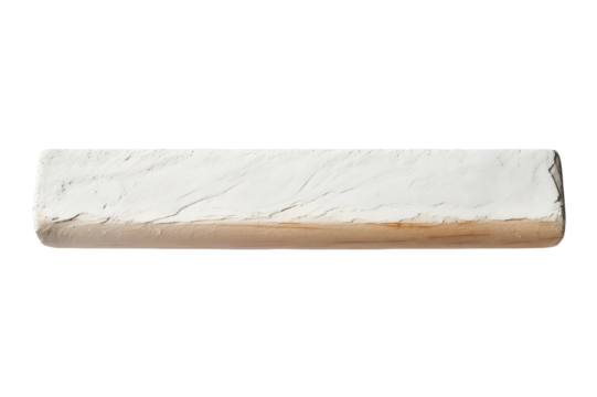 Close-up image of a long rectangular chalk piece isolated on a white background, ideal for educational or artistic use.