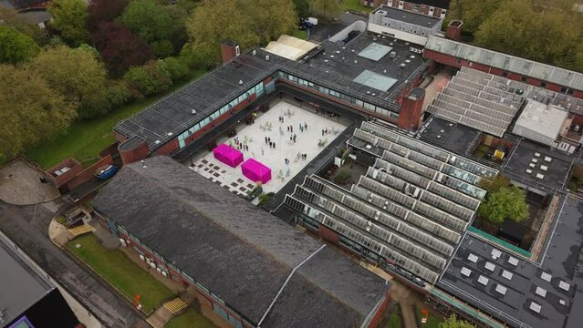 Drone shot of the University for the Creative Arts Farnham during an open day.
