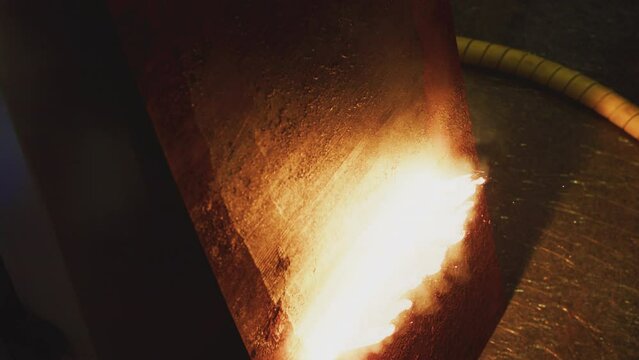 Metalworking. Modern technology. Laser cleaning of metal. Industrial removal of rust of metal surface with laser beam.