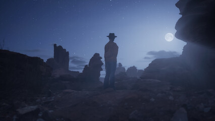 Cowgirl standing in Rocky Desert with Rock Formations. Sandstone. Night with stars and moonlight