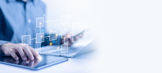 businessman design workflow automation with flowcharts. concept of model work structure digital, diagram algorithm flow, hierarchy scheme. business process and data management organigram