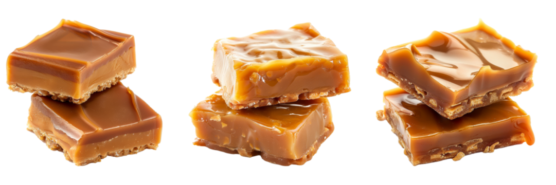 Isolated on a white background, two pieces of toffee topped with melted caramel..