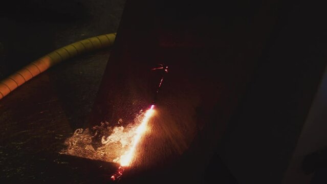 Metalworking. Modern technology. Laser cleaning of metal. Industrial removal of rust of metal surface with laser beam.