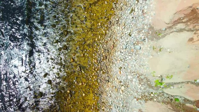 Mossy Rock Beach Aerial Cinematic Video with White Waves on Atlantic Sea Coast