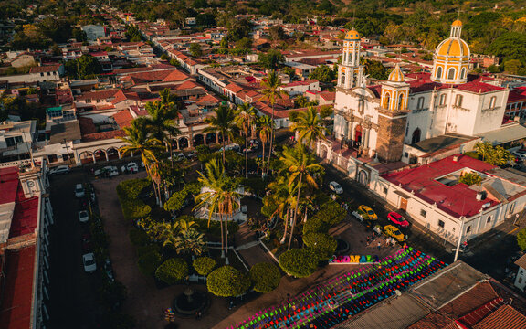 Aerial view of vibrant city with red rooftops: Comala, Colima, Mexico