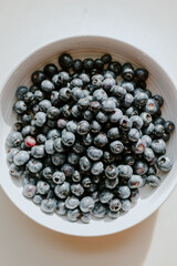Fresh blueberries in a bowl on a table