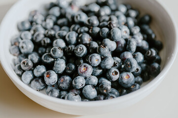 Fresh blueberries in a bowl on a table