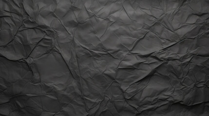 Black paper crumpled background texture