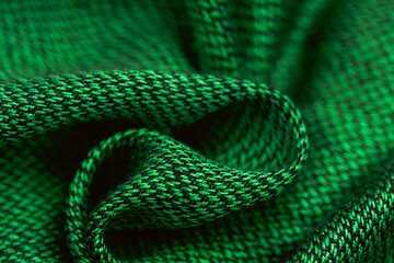Obraz premium Close-up of green knitted fabric texture