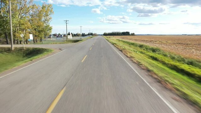 Drone shot of a rural road in Lethbridge County.