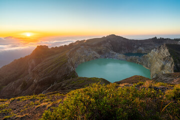 Scenic view of a crater lake in Kelimutu national park on Flores island, Indonesia © Wirestock