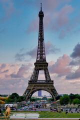 Iconic Eiffel Tower silhouette against a colorful sunset sky