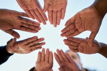 Friends, people or hands in huddle in outdoor campus meeting for group, team building or low angle. Palm, college and university students in collaboration for teamwork, leaning or education at school
