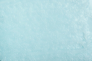 Bubble texture of liquid cosmetic product. Texture background. Swatch of cosmetics for face and body