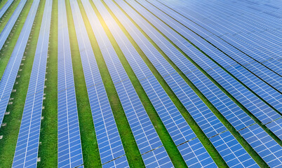 Solar farm and sun light. Solar power for green energy. Sustainable renewable energy. Photovoltaic power station or solar park. Solar panel installation and maintenance concept. Energy sustainability.