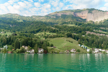 Lake Lucerne and the Alpine mountains in summer, Switzerland. Eco travel routes in Europe.