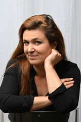 portrait of female naturopath reflexologist in her office