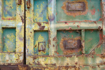 yellow orange blue rusty  iron plate. background textured rustic iron.